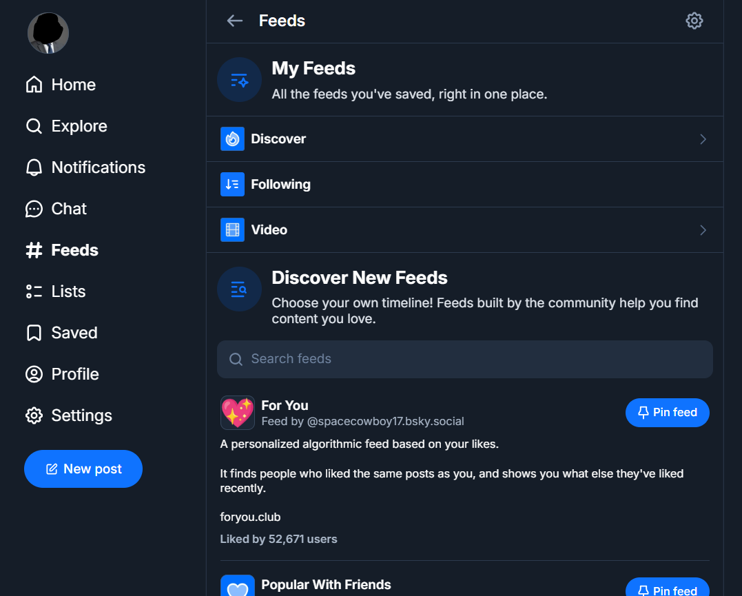 The Feeds screen on Bluesky showing saved feeds and the Discover New Feeds browser with community-built feeds and Pin feed buttons